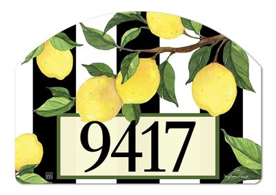 Close-up of magnetic yard sign design with bright yellow lemons, green leaves, and address numbers.