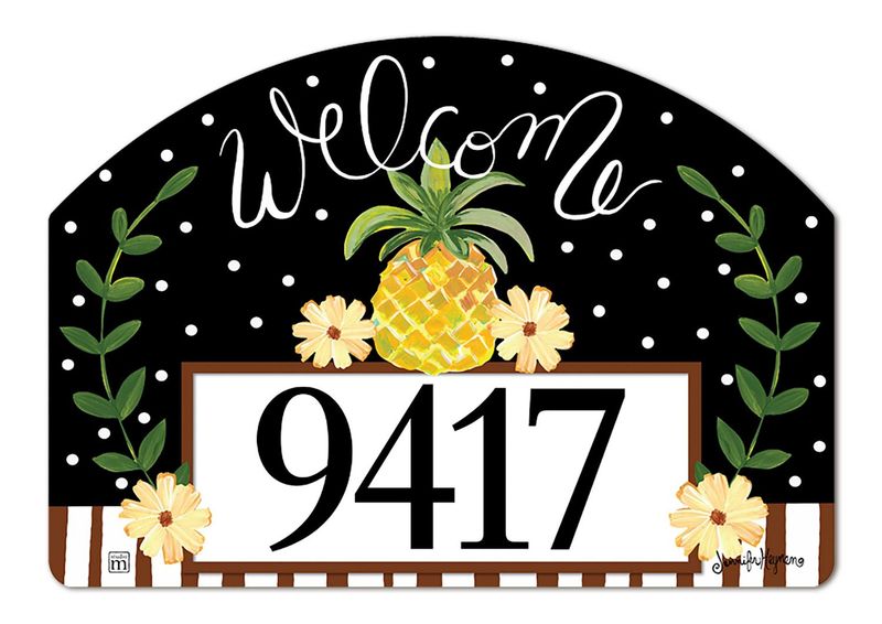 Close-up of magnetic yard sign design showing a yellow pineapple, "Welcome" text, and address numbers.