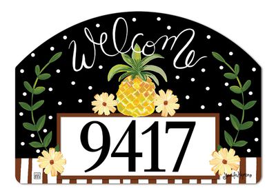 Close-up of magnetic yard sign design showing a yellow pineapple, "Welcome" text, and address numbers.