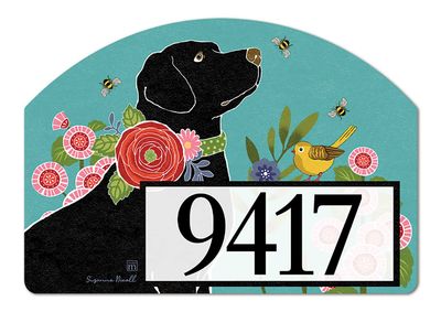 Close-up of a magnetic yard sign design showing a black dog, pink flowers, and adhesive address numbers.
