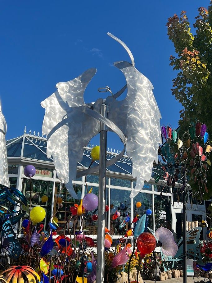 SMALL DOWN WING ANGEL WINDSCULPTURE STAINLESS STEEL