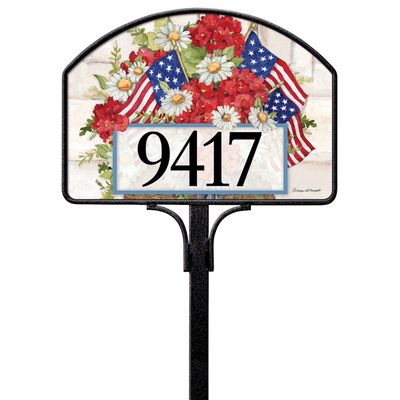 American flag and floral magnetic yard sign displaying the number 9417, installed on a metal stake.