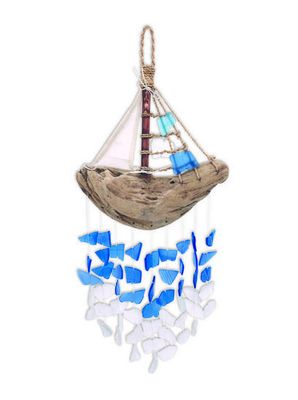 Driftwood sailboat wind chime with blue and white hanging glass pieces.