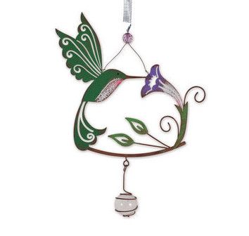Green hummingbird hanging decoration with purple flower and small dangling charm on a spring.