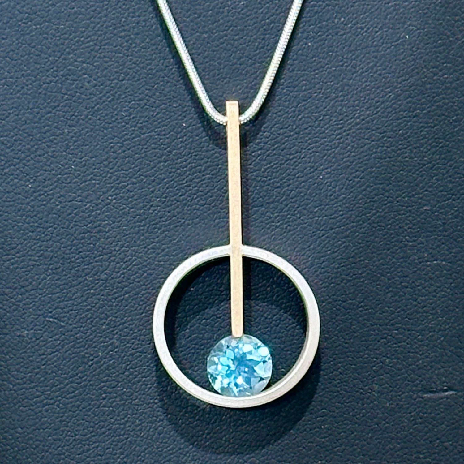 BLUE TOPAZ SUNRISE ON SS CHAIN