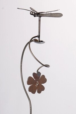 Full view of a handcrafted metal garden balancer stake featuring a dragonfly and flower counterweight.