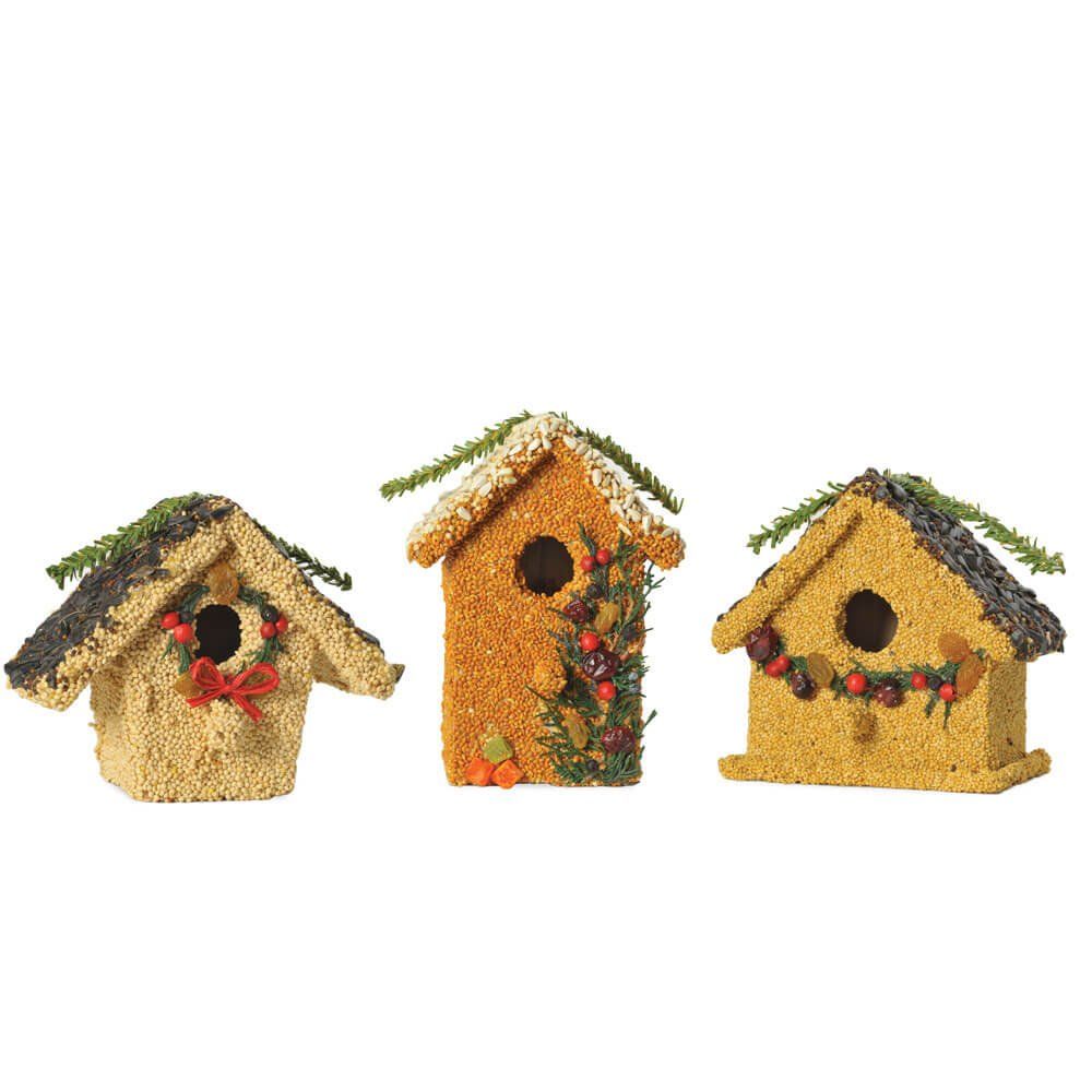 Side-by-side comparison of three seeded birdhouses with red, green, and brown roof accents.