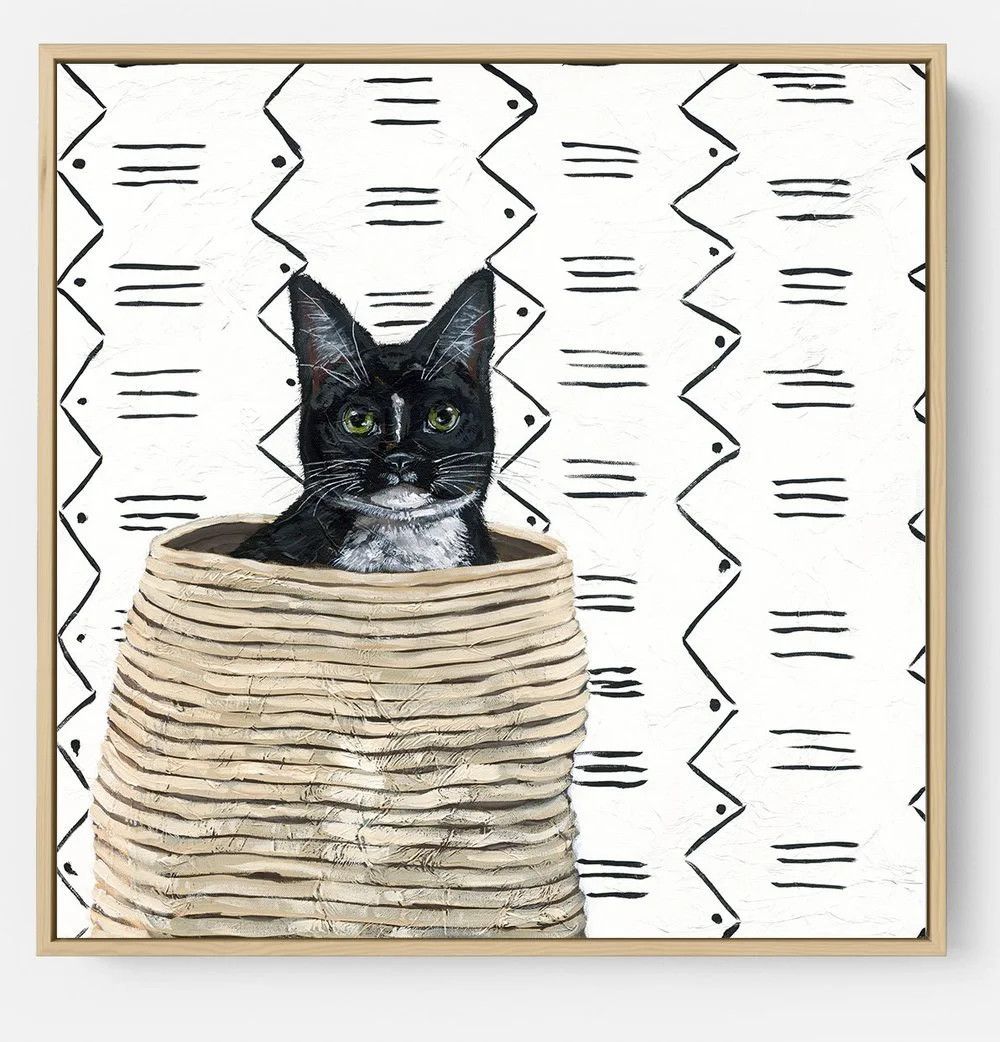 print featuring an adorable illustration of a black cat poking its head out from inside a woven basket