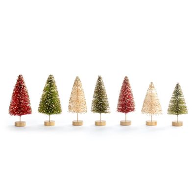 A row of small, assorted bottle brush Christmas trees in various muted colors (red, beige, gold, green, white