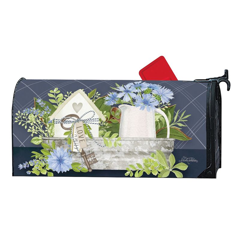 Mailbox cover featuring white flowers, green leaves, and red accents on a light background.