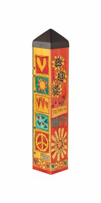 20-inch You Are My Sunshine garden art pole installed outdoors among green foliage.