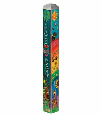 Close-up of the "Peace Love Dog" text and whimsical folk-art style dog motifs.