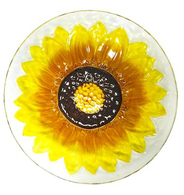 Overhead view of the sunflower glass bird bath showing the textured dark brown center.