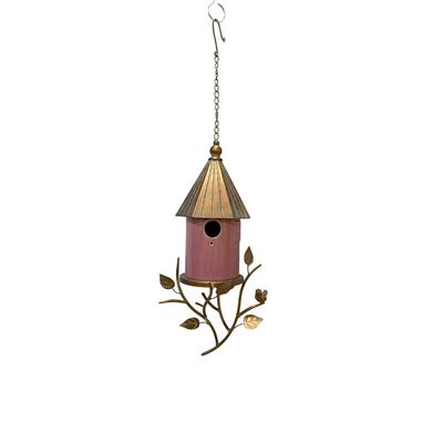 Pink porcelain hanging birdhouse with antique copper metal roof, decorative branches, leaves and small bird accent.