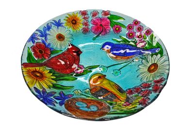 18-inch glass bird bath plate featuring a cardinal, bluebird, and goldfinch with flowers.