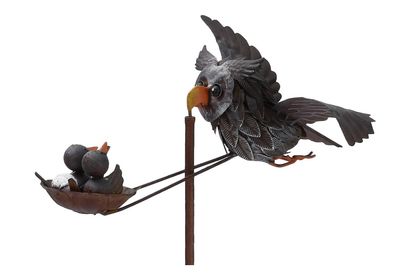 Close-up of the metal balance arm and stake mechanism for the kinetic owl garden balancer.