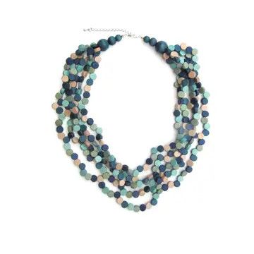 A handcrafted, oval-shaped beaded necklace featuring smooth wooden beads in soft sage green and muted turquoise