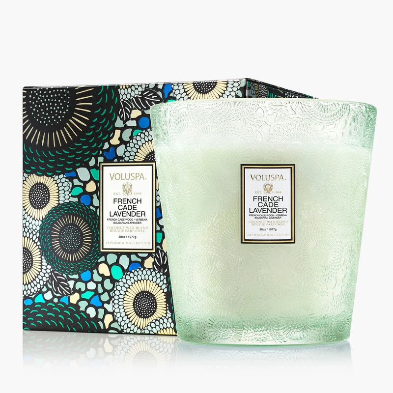 Large three-wick candle in a mist-blue embossed glass jar featuring an intricate Japonica pattern.