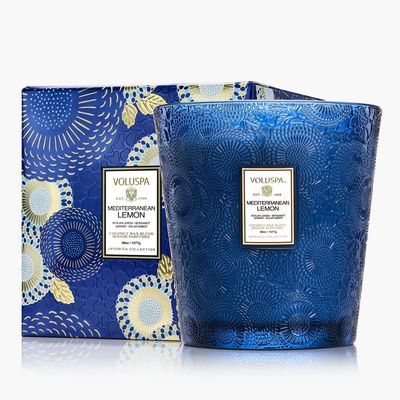 Large three-wick candle in a deep blue embossed glass jar with an intricate Japonica pattern