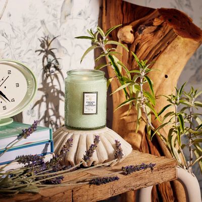 Lifestyle view of the French Cade Lavender small jar in a cozy indoor setting, highlighting the intricate Japonica texture.