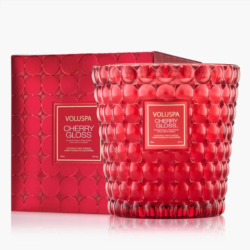 Large 3-wick candle in a vibrant red embossed glass jar with a textured "bubble" pattern.