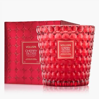Large 3-wick candle in a vibrant red embossed glass jar with a textured "bubble" pattern.