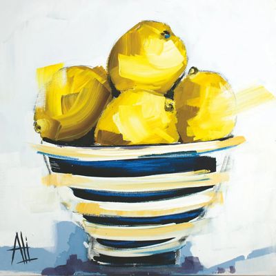 paper lunch napkins featuring a vibrant illustration of fresh yellow lemons resting in a blue and white patterned bowl