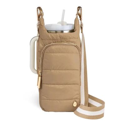 Khaki quilted water bottle crossbody bag with white striped adjustable strap and gold hardware.
