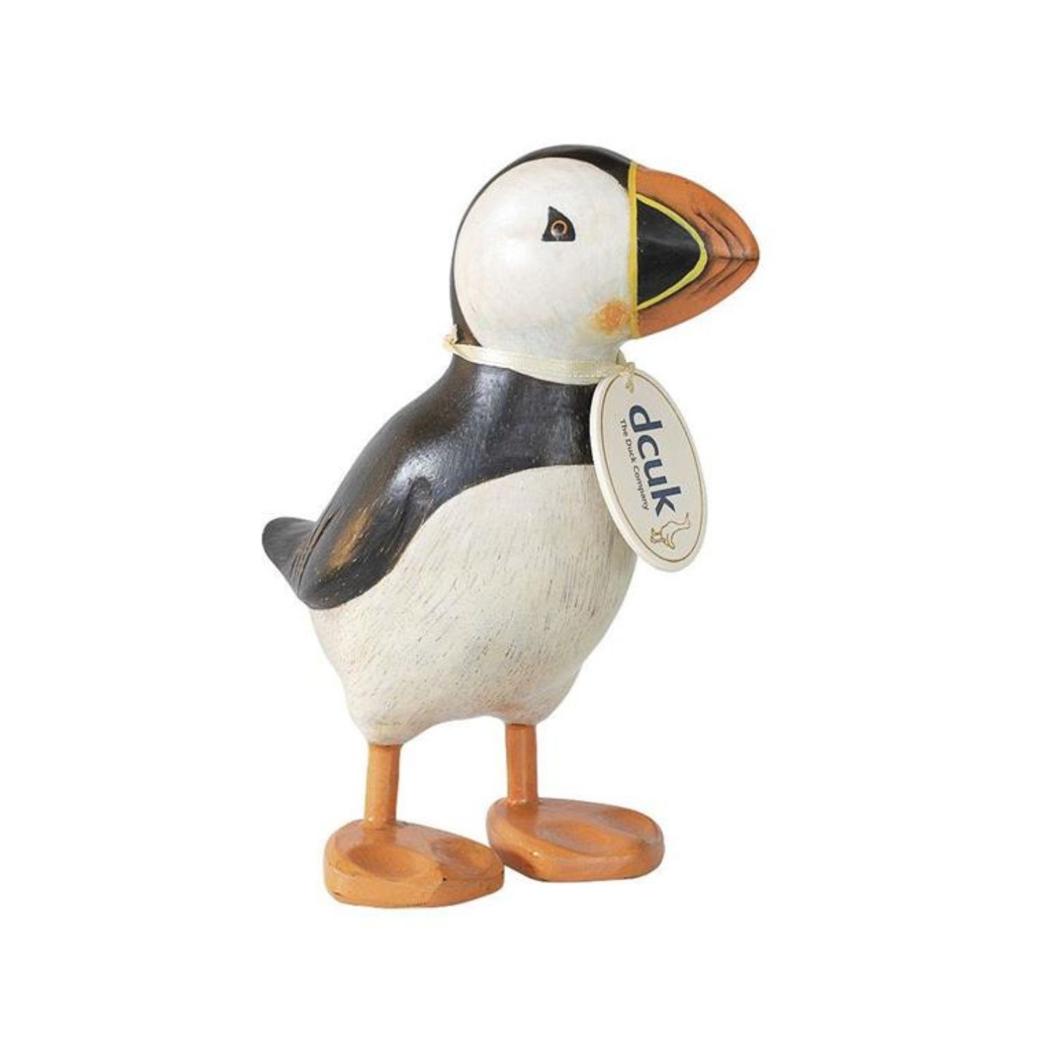 Hand-carved wooden puffin figurine with black back and white belly standing upright with orange feet.