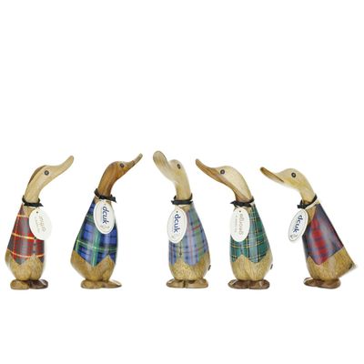 Five hand-carved wooden duck figurines wearing colorful tartan waistcoats displayed in a row.