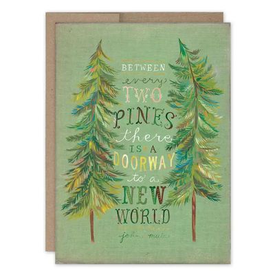 Nature-inspired A6 blank greeting card featuring an illustration of two pine trees and gold foil details by Katie Daisy, show