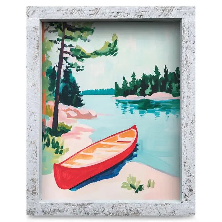 8x12 art print of a red canoe sitting by a peaceful lake in pastel colors, set in a real wood frame.