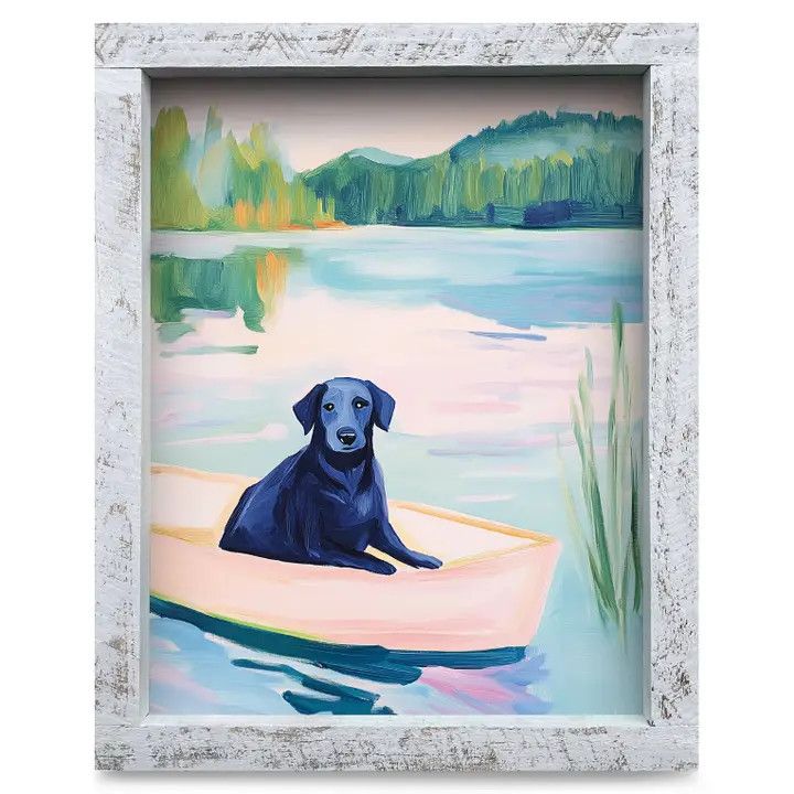 8x12 art print of a black Labrador retriever sitting in a boat on a lake, enclosed in a real wood frame.