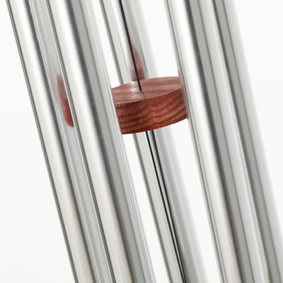 Woodstock Art Deco Bauhaus wind chime with silver tubes, wood accents and colorful geometric stained-glass-effect wind catche