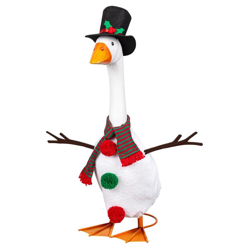 Giddy the Porch Goose in a snowman costume with branch-shaped arms, red and green pom-pom buttons, a striped scarf, and top h
