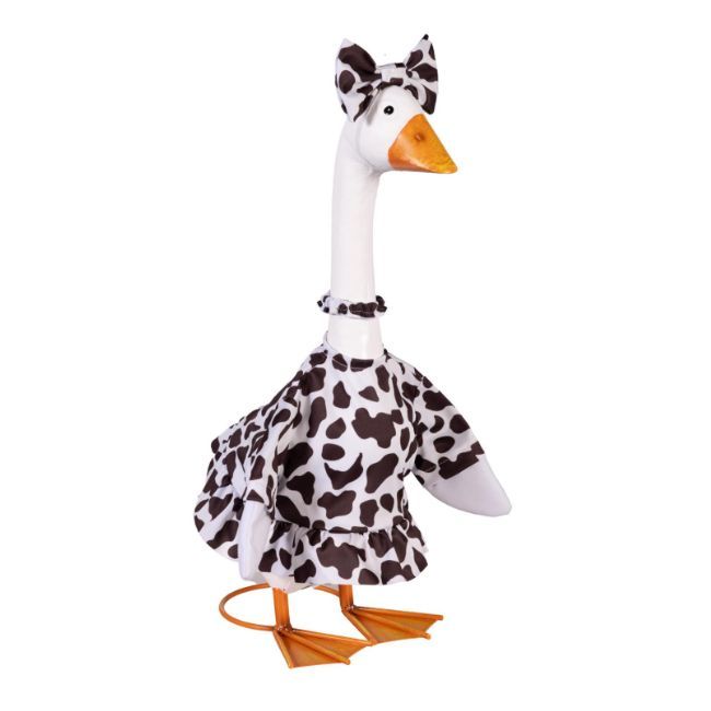 Giddy the Porch Goose wearing a black-and-white cow print gown with a ruffled hem, matching neck accent, and oversized hea