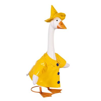 Giddy the Porch Goose wearing a bright yellow raincoat with blue buttons, a folded collar, and a matching yellow hat.