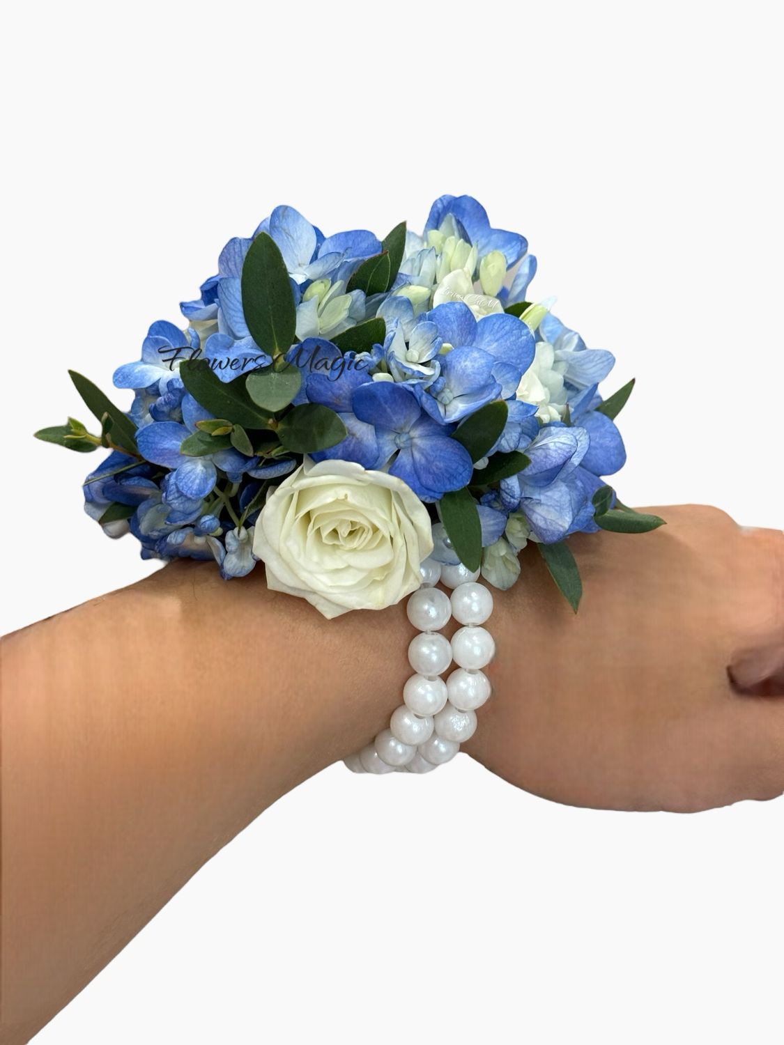 corsage with white rose and blue hyacinth
