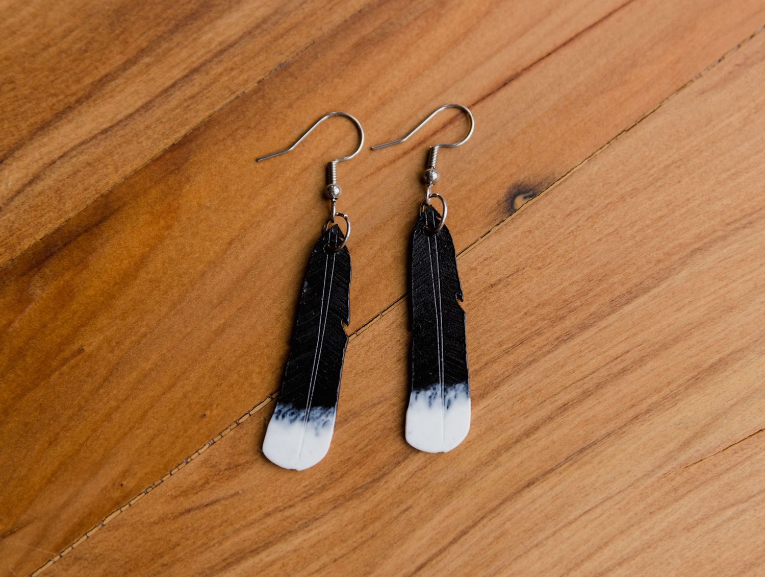 Earrings- Huia Feathers