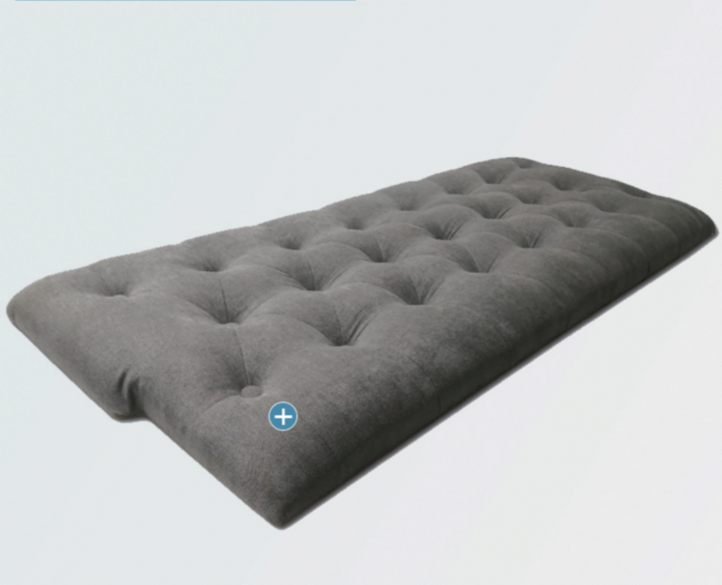Dark Grey upholstered headboard with white background.