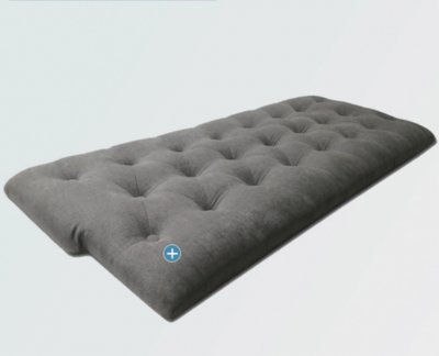Dark Grey upholstered headboard with white background.