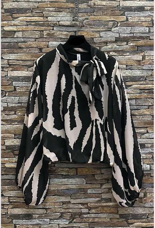 Chique blouse met print en romantische soepelvallende mouwen – trendy met viscose voering