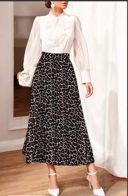 Lange plooirok met print-  geplisseerde midi rok met panterprint en viscose voering 