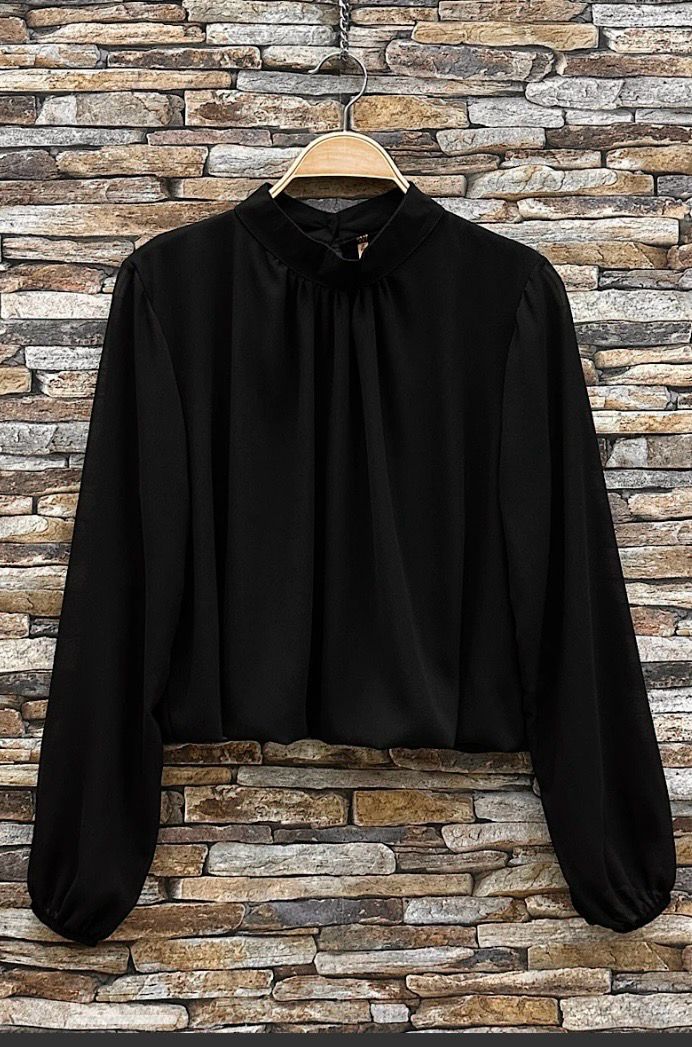 Elegante blouse in effen kleur en romantische soepelvallende mouwen – trendy met viscose voering