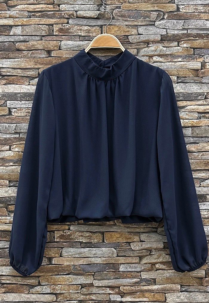Elegante blouse in effen kleur en romantische soepelvallende mouwen – trendy met viscose voering