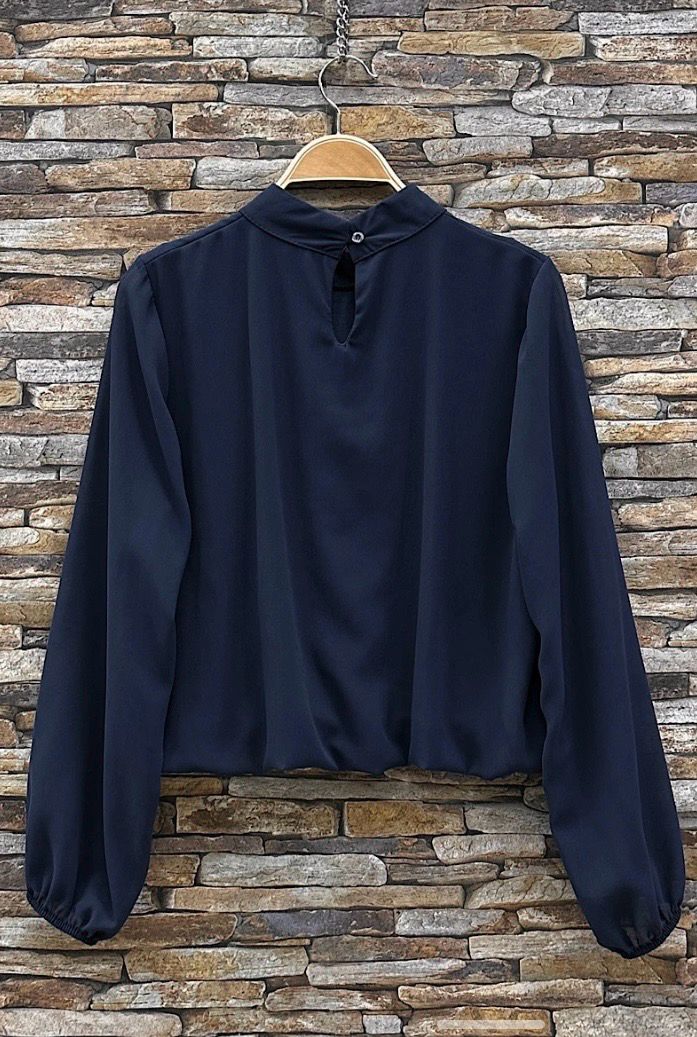 Elegante blouse in effen kleur en romantische soepelvallende mouwen – trendy met viscose voering