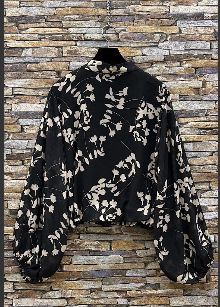 Chique blouse met print en romantische soepelvallende mouwen – trendy met viscose voering