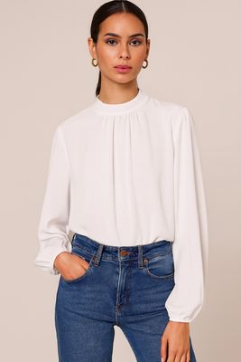 Elegante blouse in effen kleur en romantische soepelvallende mouwen – trendy met viscose voering