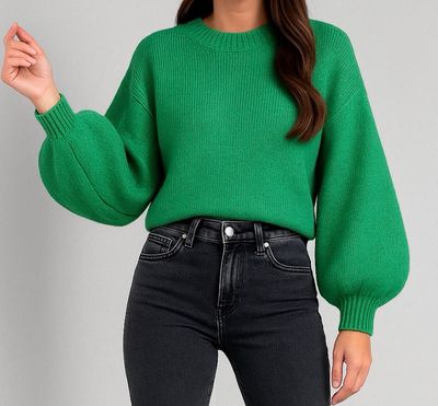Model draagt groene knit comfy sweater met ballon mouwen