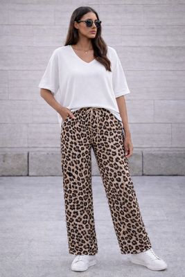 Losse broek in viscose silk effect met zakken- romantische soepelvallende broek voor dames